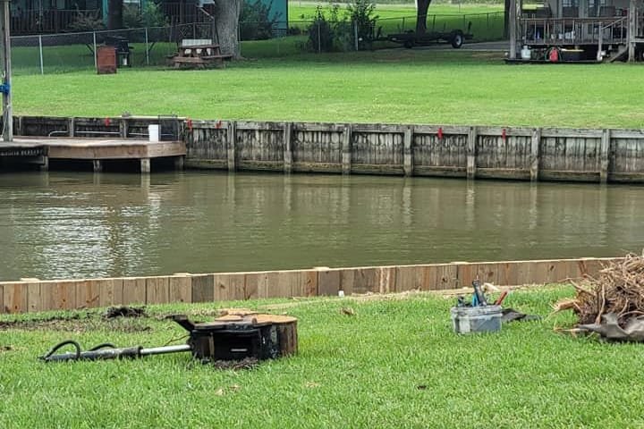 Finished wood bulkhead along a canal lot