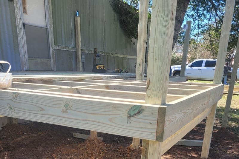 Deck framing with joists and posts, before the decking goes on