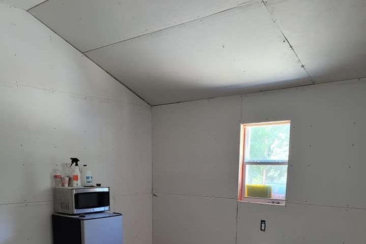 Drywalled room inside a portable building