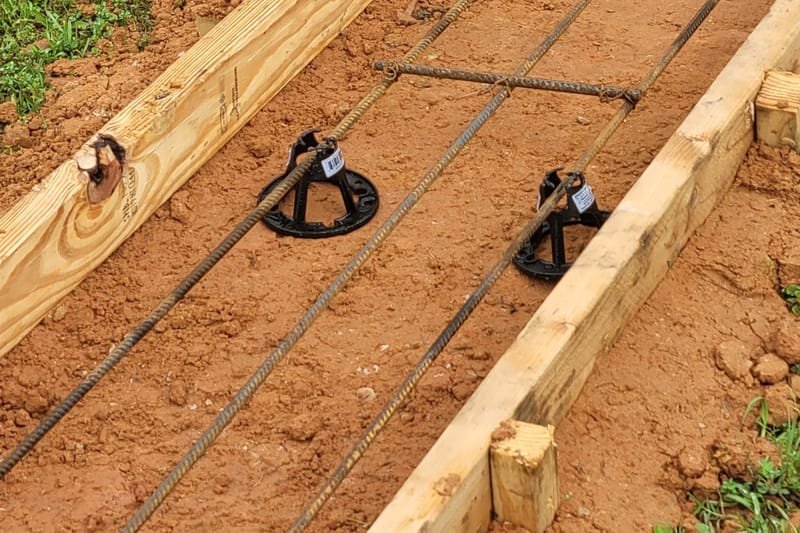 Rebar tied on chairs inside wood forms