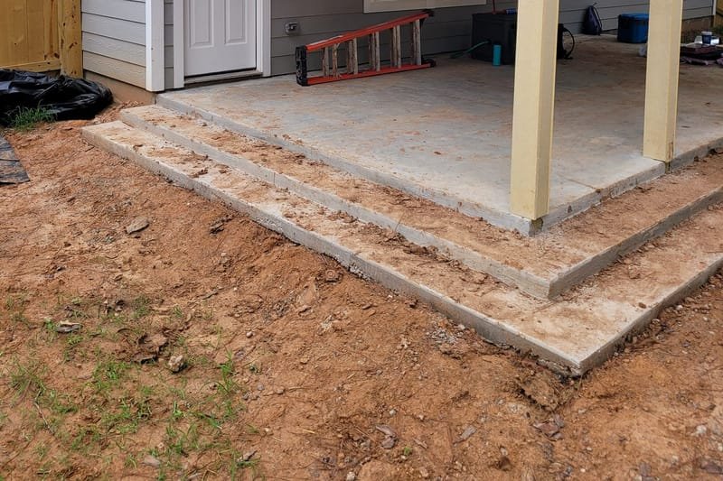 New covered patio over a concrete slab at a back door
