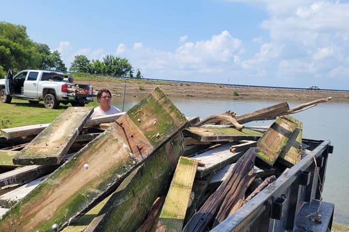 Old pier lumber loaded in a trailer for haul-off