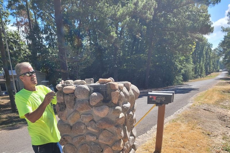 River rock mailbox column taking shape